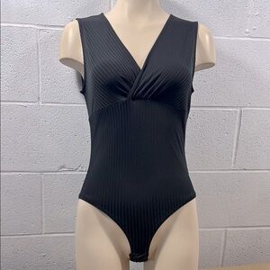 Black Ribbed V-Neck Bodysuit​​​​​